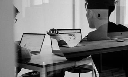 Two persons working